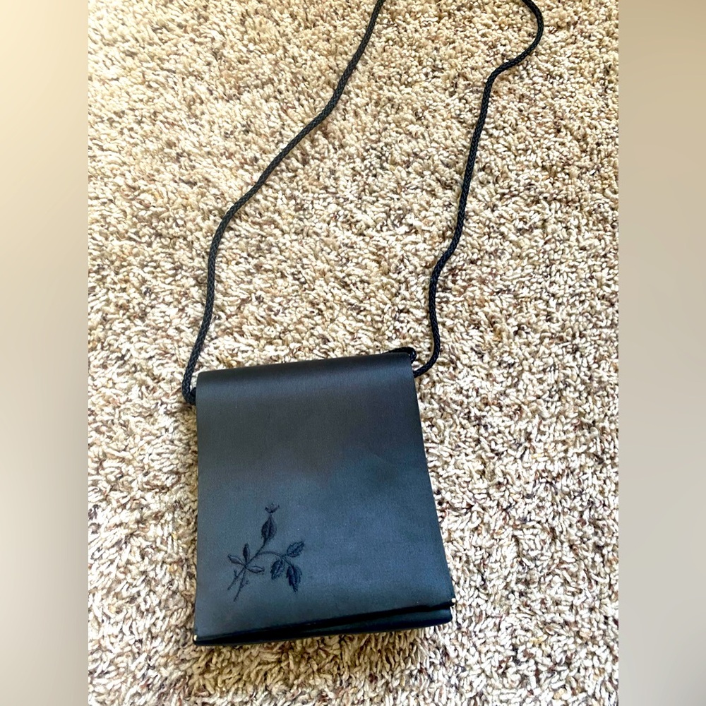 3 small black purple clutch bags